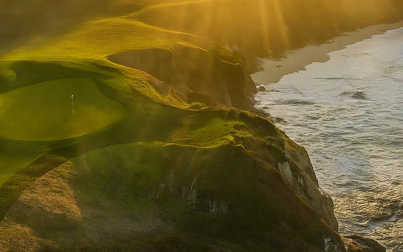 Pebble Beach golf course with coastal holes overlooking the Pacific Ocean